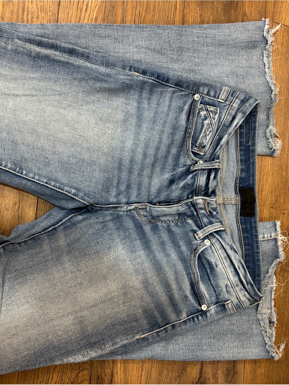 Buckle Wide Leg Jeans in Light Blue Wash